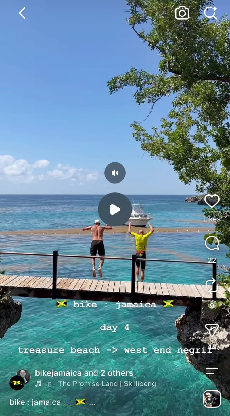 Two cyclists leaping from a jetty into the sea at West End Negril on day four of the Bike Jamaica ride, from the ride's Instagram